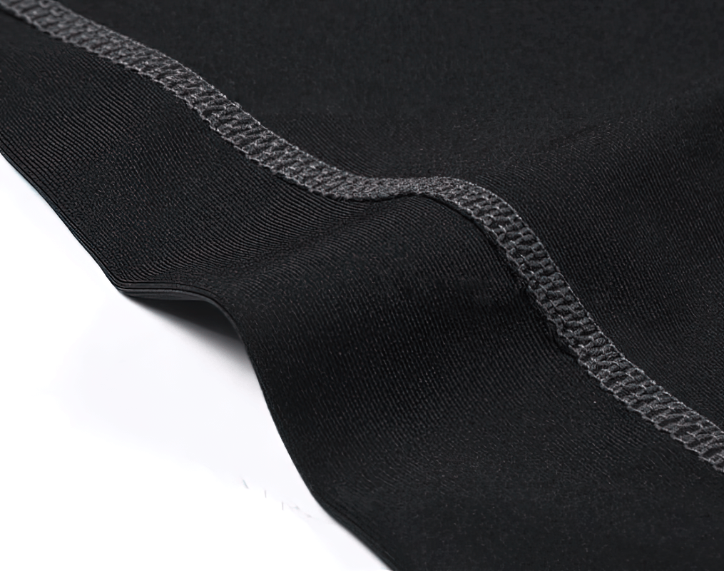 Close-up of black quick-dry sports shirt fabric and stitching, perfect for fitness and workout activities.