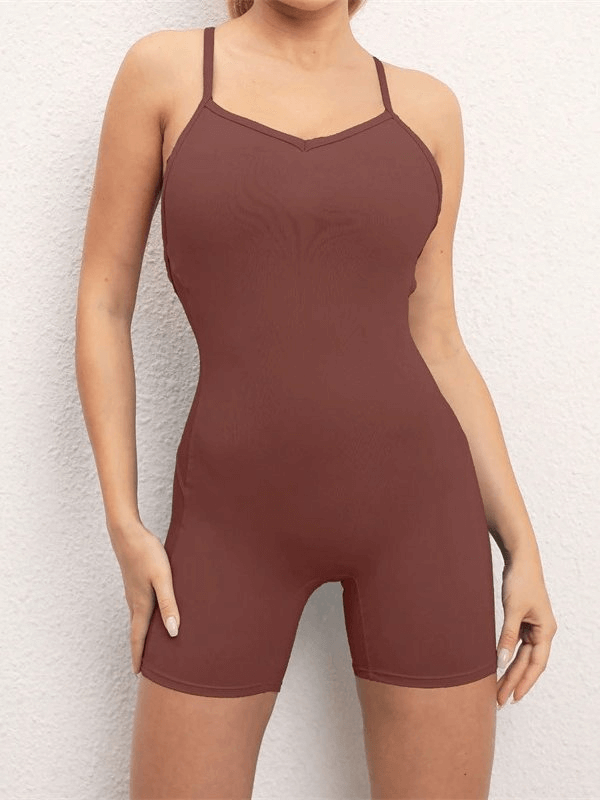 Women's elastic open-back sports jumpsuit in maroon, featuring high elasticity and breathable fabric for active comfort.