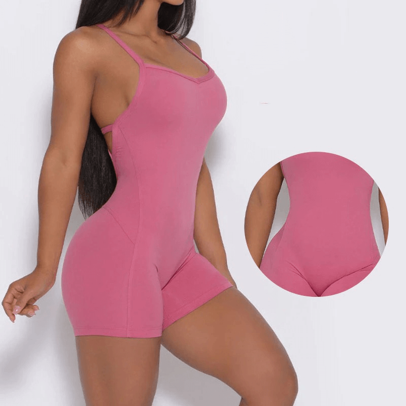 Elastic Sports Short Women's Open-Back Jumpsuit in pink, showcasing breathable, sweat-wicking fabric and stylish open-back design.