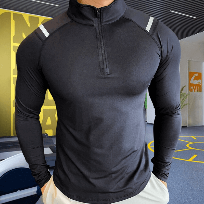 Elastic stylish sports men's top with long sleeves and zipper; slim fit microfiber design, perfect for modern athletic wear.