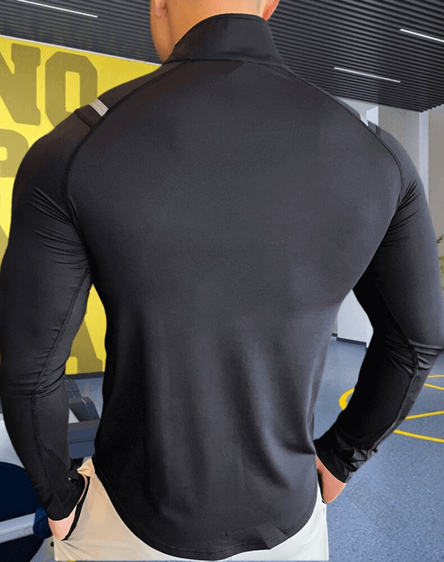 Stylish men's long-sleeve sports top with zipper, slim fit, microfiber fabric, ideal for modern athletic fashion.