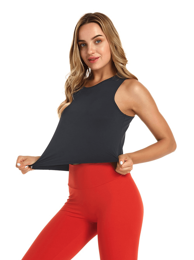 Elastic stylish women's top with back cutout, perfect for yoga, shown in black with lightweight, breathable fabric.