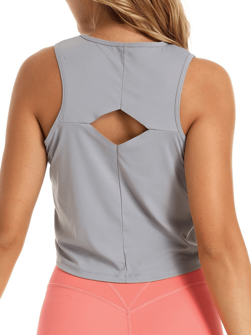 Elastic stylish women's top with a back cutout, perfect for yoga. Lightweight and breathable design for active women, model SF1152.
