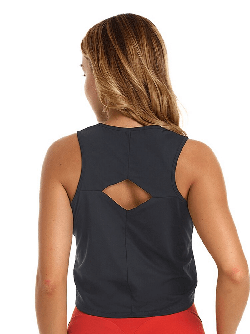 Elastic stylish women's top with back cutout in black, perfect for yoga and active wear, made of breathable nylon and spandex.