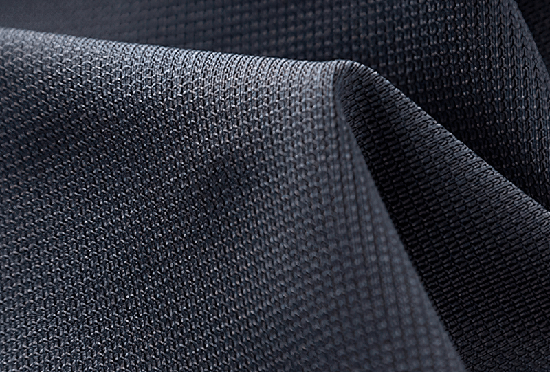 Close-up of elastic breathable polyester fabric in deep grey, ideal for training tanks and fitness sports clothes - SF1183