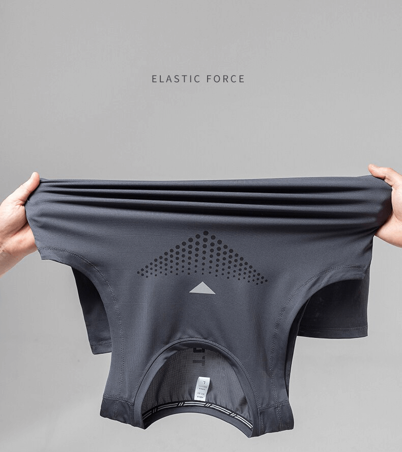 Elastic breathable training tank being stretched for durability test.