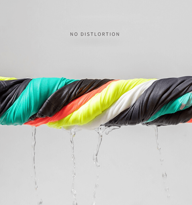 Twisted colorful fabric demonstrating elasticity and breathability with water dripping, highlighting no distortion for fitness wear.
