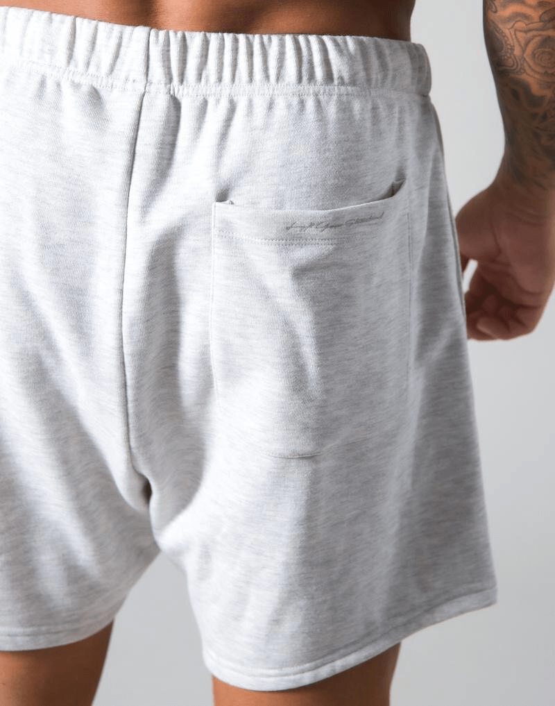 Back view of gray elastic waist patchwork running shorts with pocket, perfect for workouts and sports. Comfortable and ventilated.