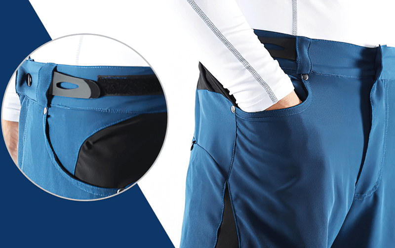 Blue men's cycling shorts with elastic waistband, side pockets, and reflective features, designed for performance and comfort.