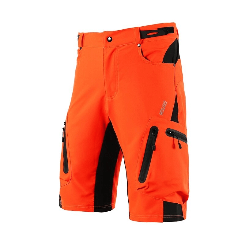 Bright orange cycling shorts with elastic waistband and side pockets, designed for durability and comfort. Model: SF0593.