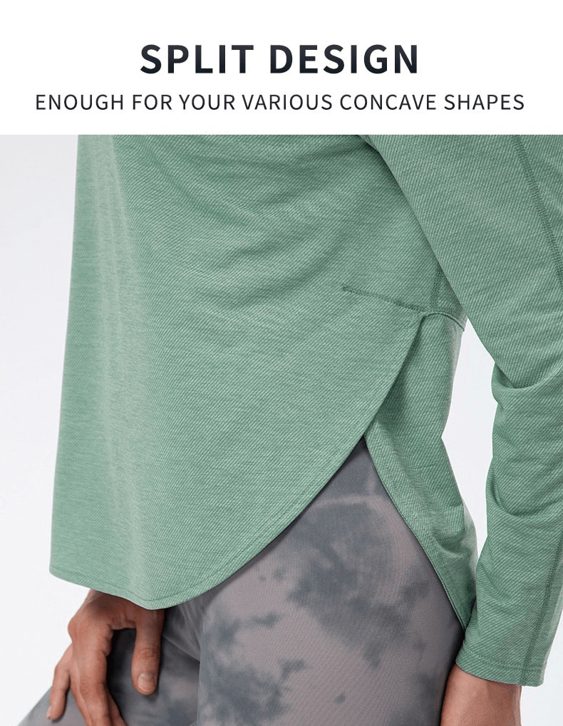 Green sports top with draped hem and long sleeves, showcasing a stylish split design for yoga. Made from breathable polyester and spandex.