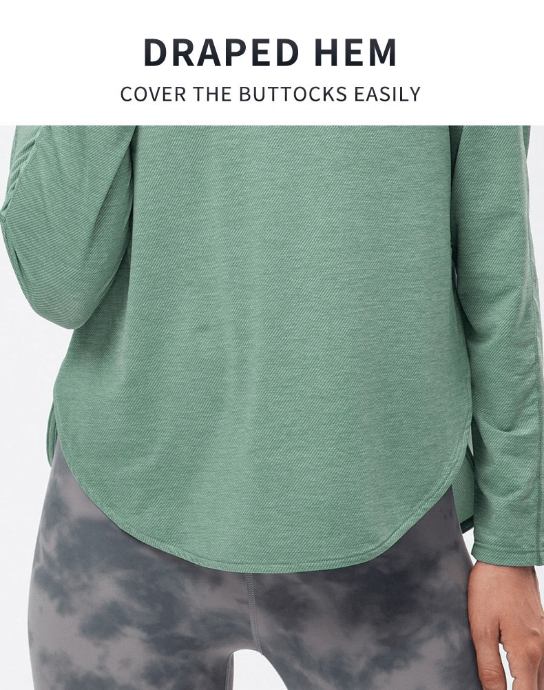 Back view of green draped hem sports top with long sleeves and split design, perfect for yoga and workouts.