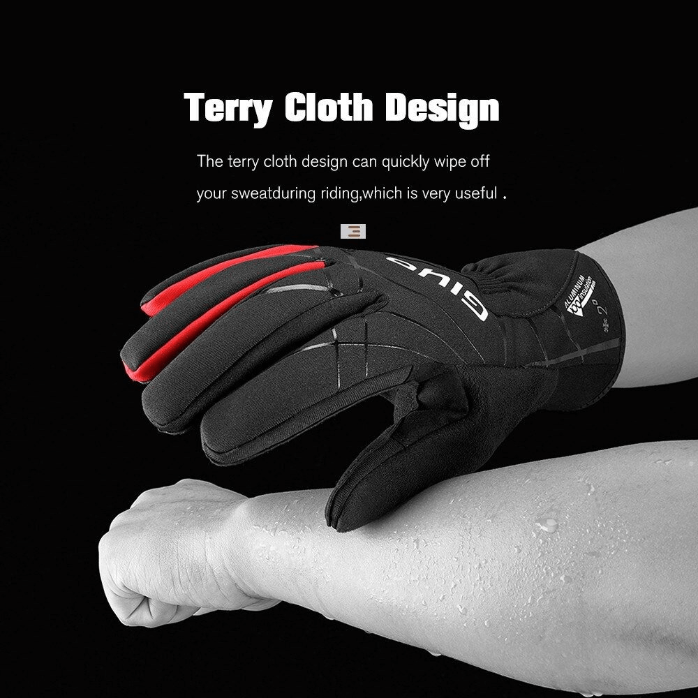 Black windproof cycling gloves with terry cloth design wiping sweat from a forearm, showcasing durability and practicality.