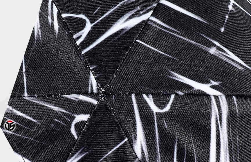 Close-up of a fashion bicycle beanie cap with black and white abstract pattern, made from breathable quick-dry fabric.