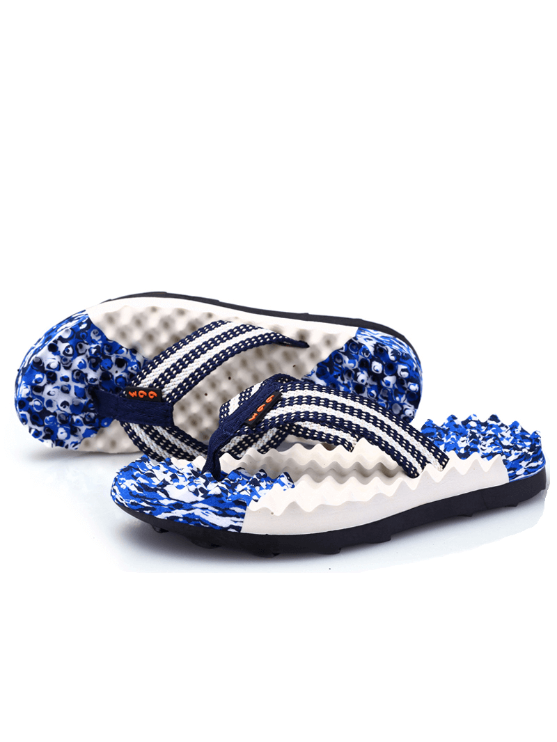 Fashionable and breathable outdoor massage flip flops for men, featuring EVA insoles and rubber outsole, stylish blue and white design.