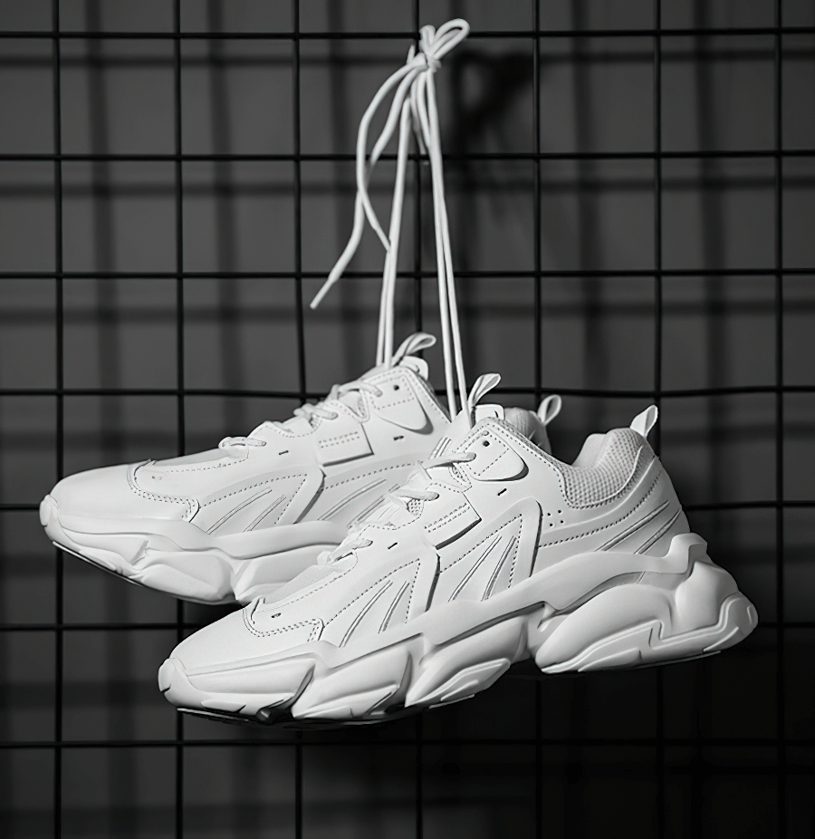 Fashion lace-up platform male sneakers in white, featuring sports mesh for breathability and EVA outsole for cushioning on a black grid.