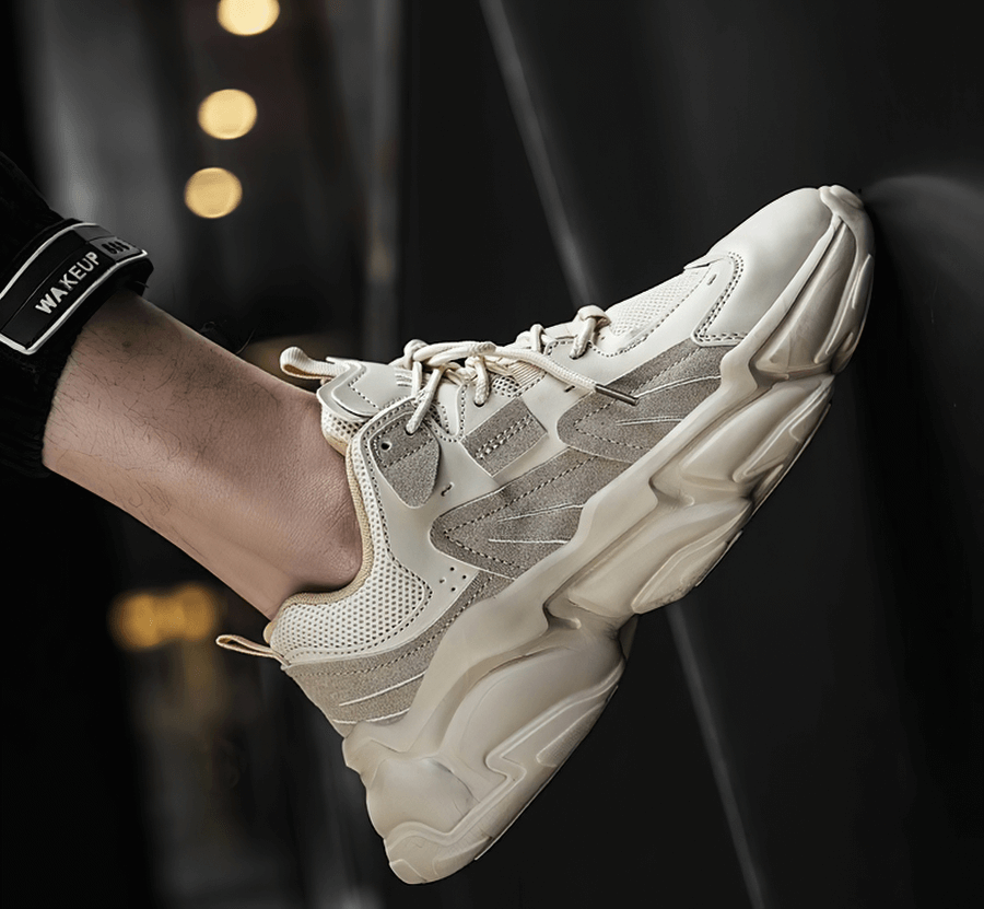 Stylish lace-up platform sneakers for men with breathable mesh, EVA outsole, and secure fit in urban setting.