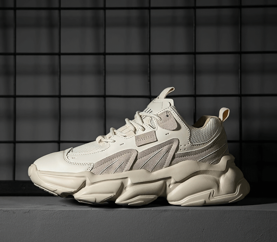 Stylish cream-colored lace-up platform sneakers for men with breathable mesh and EVA support, perfect for sports and casual wear.
