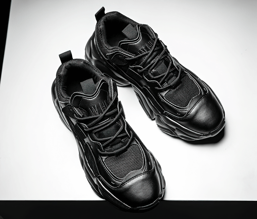 Stylish lace-up black platform sneakers with breathable mesh design for men, featuring comfortable EVA outsole and secure fit.