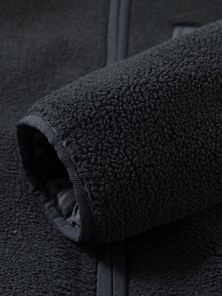 Close-up of the black fleece fabric and sleeve detail on Fashion Letter Embroidery Hooded Jacket SF0867.