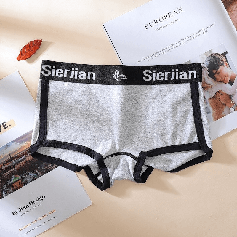 Gray cotton sports brief with stylish letter print and black trim, made from breathable cotton and spandex blend for comfort. SF0641