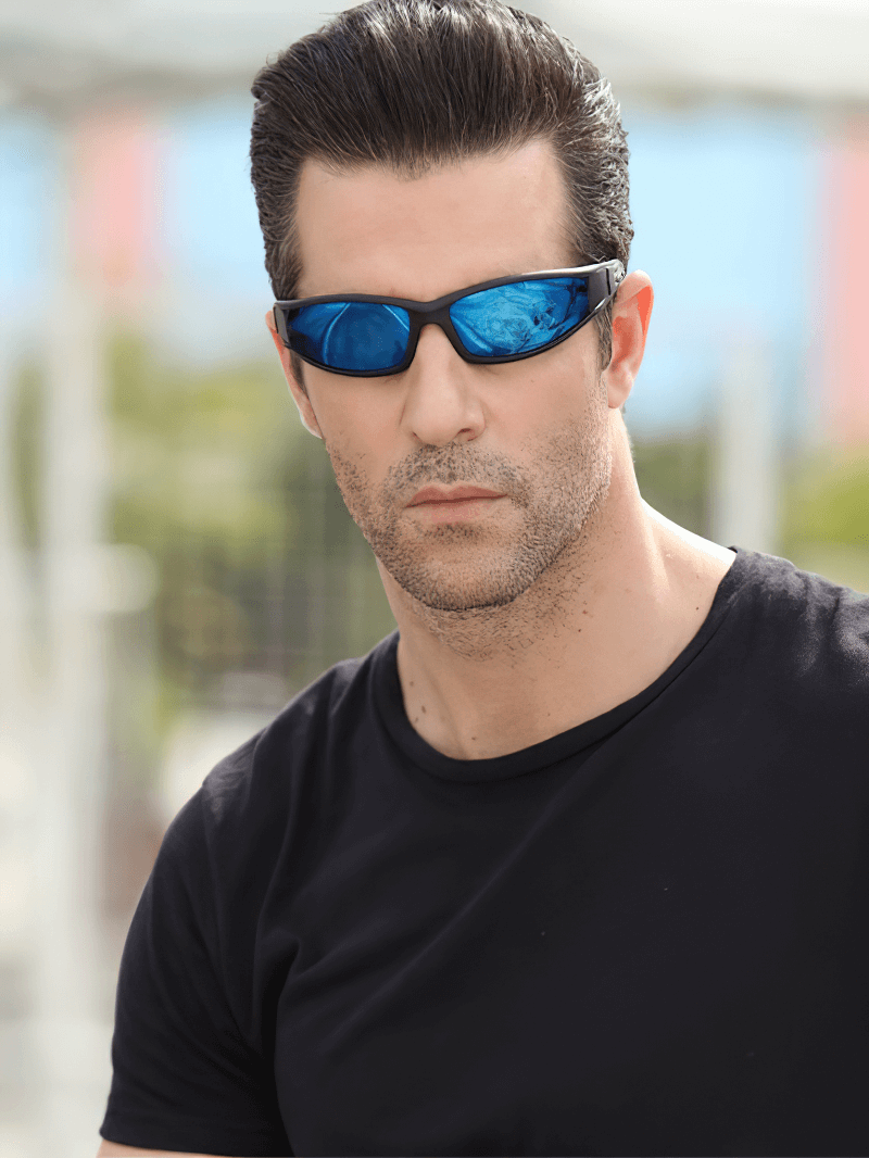 Man wearing Fashion Polarized Sunglasses with blue lenses, showcasing anti-glare design and UV protection for stylish outdoor wear.