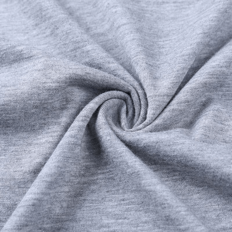 Close-up of soft, breathable broadcloth fabric in grey, showcasing the texture of a Fashion V-Neck Men's Solid Color T-Shirt, style SF1065.