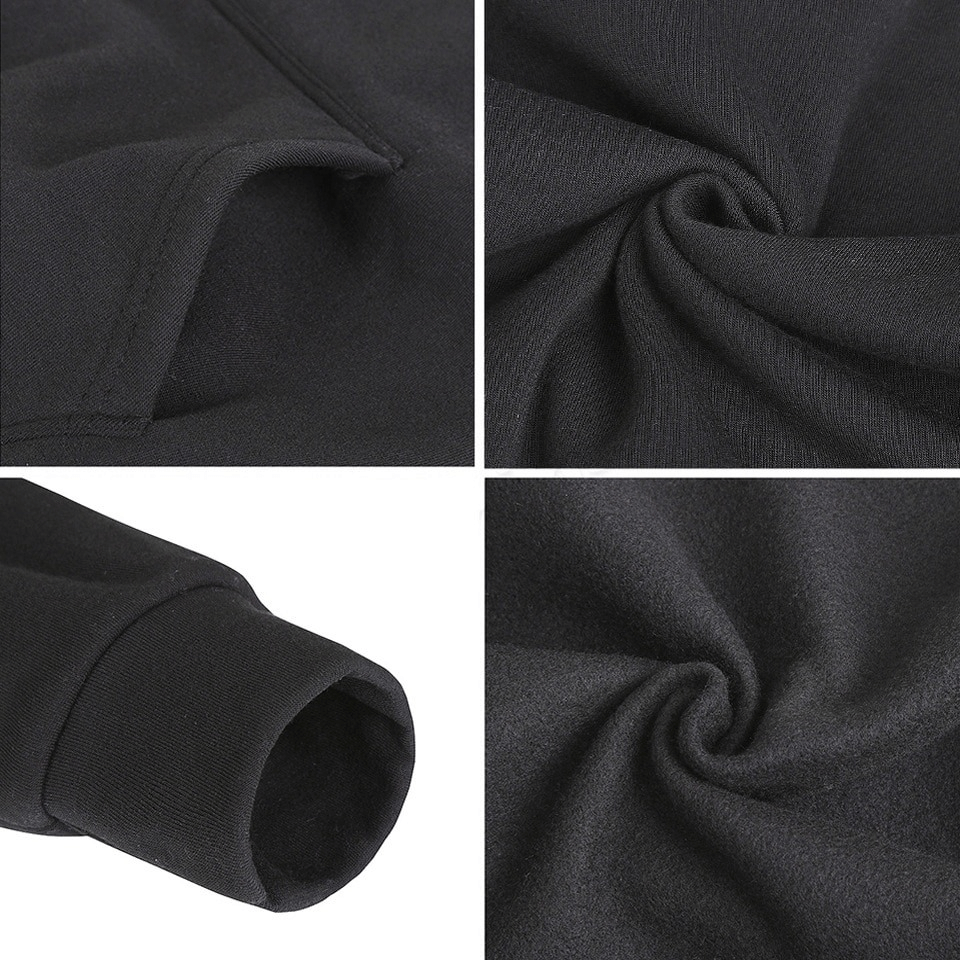 Close-up of black men's sweatshirt with hood, pockets, and soft fabric texture, showcasing sleeve detail and material quality.