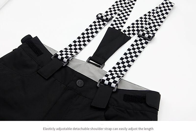 Black fashion strap ski pants for ladies with adjustable checkered suspenders, designed for snowboarding and winter sports.