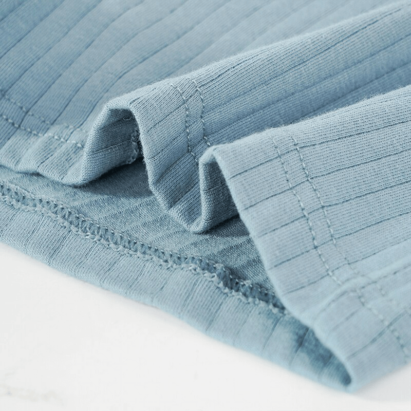 Close-up of Fashion Stripe Solid Color Cotton Boxers in blue, showcasing elegant stripe detailing and stitching.