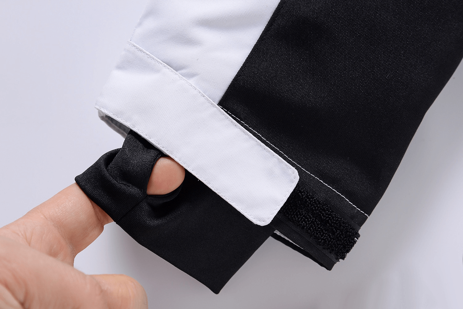 Close-up of cuff detail on Fashion Unisex Ski Jacket with finger loop for added warmth and protection.