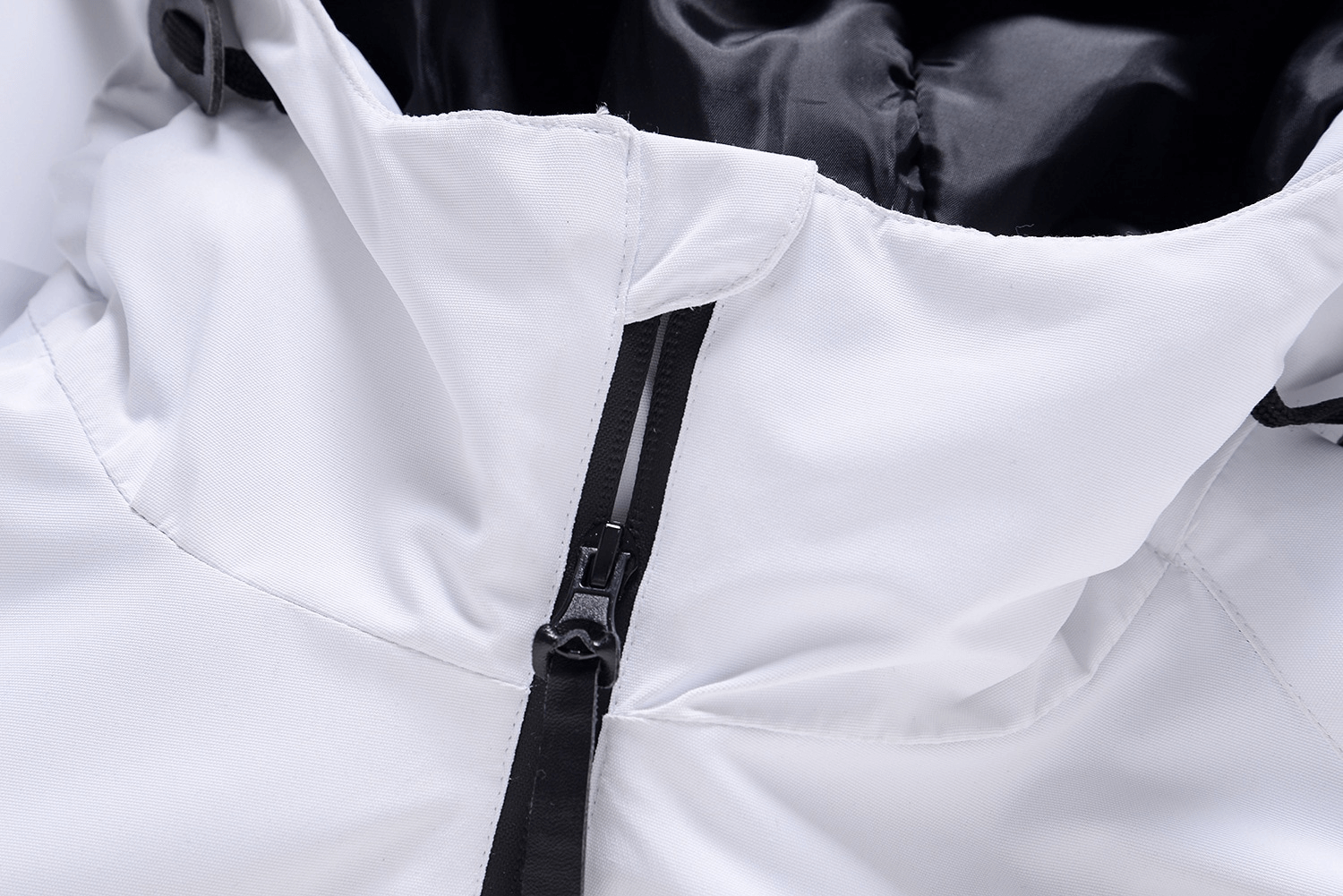 Close-up of white unisex ski jacket hood with zipper, showing waterproof and windproof fabric for outdoor adventures.