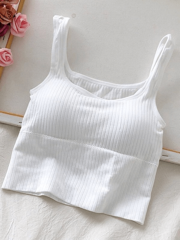 White cropped sports top with straps for women, seamless, wire-free and breathable, ideal for yoga, gym, running, and fitness.