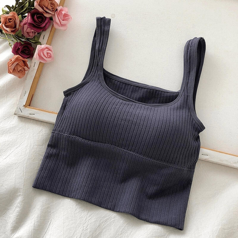 Fashionable cropped sports women's top with straps, seamless, breathable cotton, anti-sweat, quick-dry design for active lifestyle.