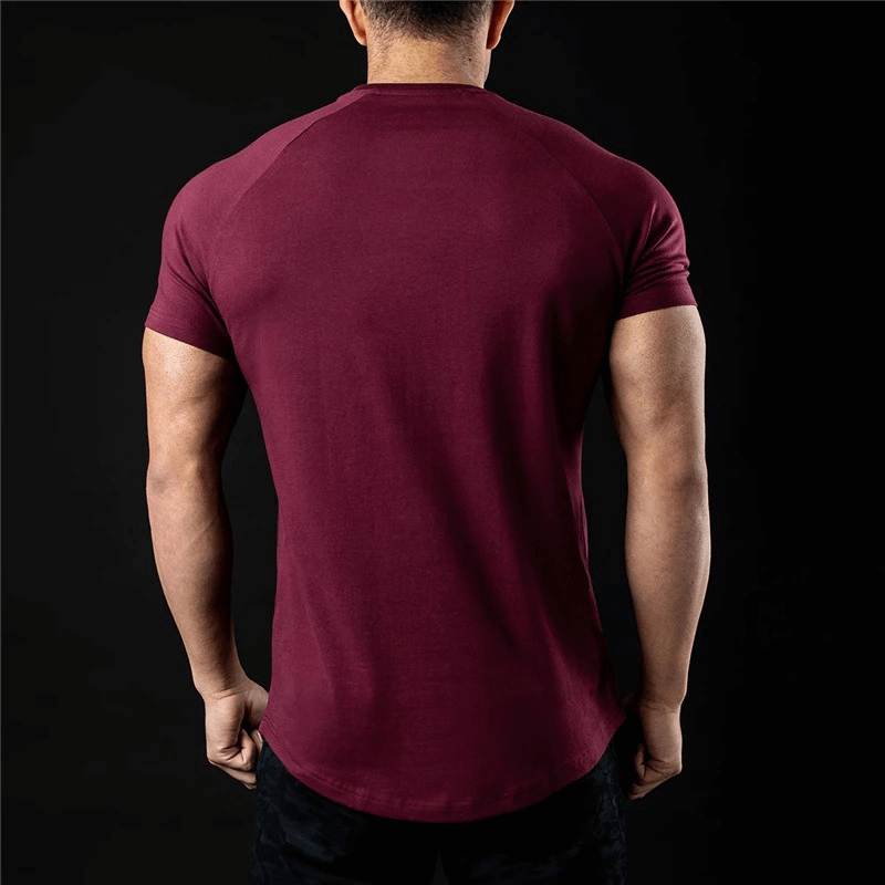 Back view of a fashionable lightweight sporty men's t-shirt in burgundy, featuring short sleeves and O-neck, perfect for training.