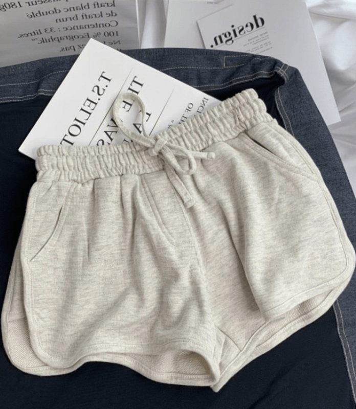 Fashionable women's high-waist loose shorts with elastic, shown in beige. Comfortable cotton-polyester-spandex blend. SF0180.