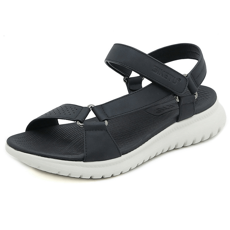 Fashionable women's black sports platform sandals with adjustable buckle and white sole, practical and stylish for the season.