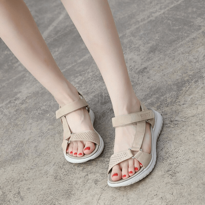 Fashionable women's platform sandals with adjustable buckle for sports, featuring a beige PU material and a stylish rubber outsole.