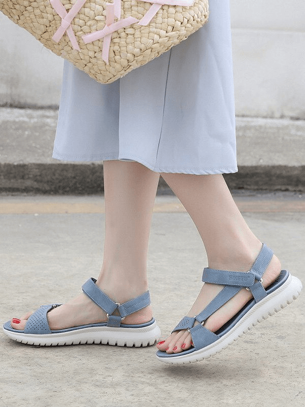 Stylish women's platform sandals with adjustable buckle and rubber outsole, perfect for comfort and fashion.