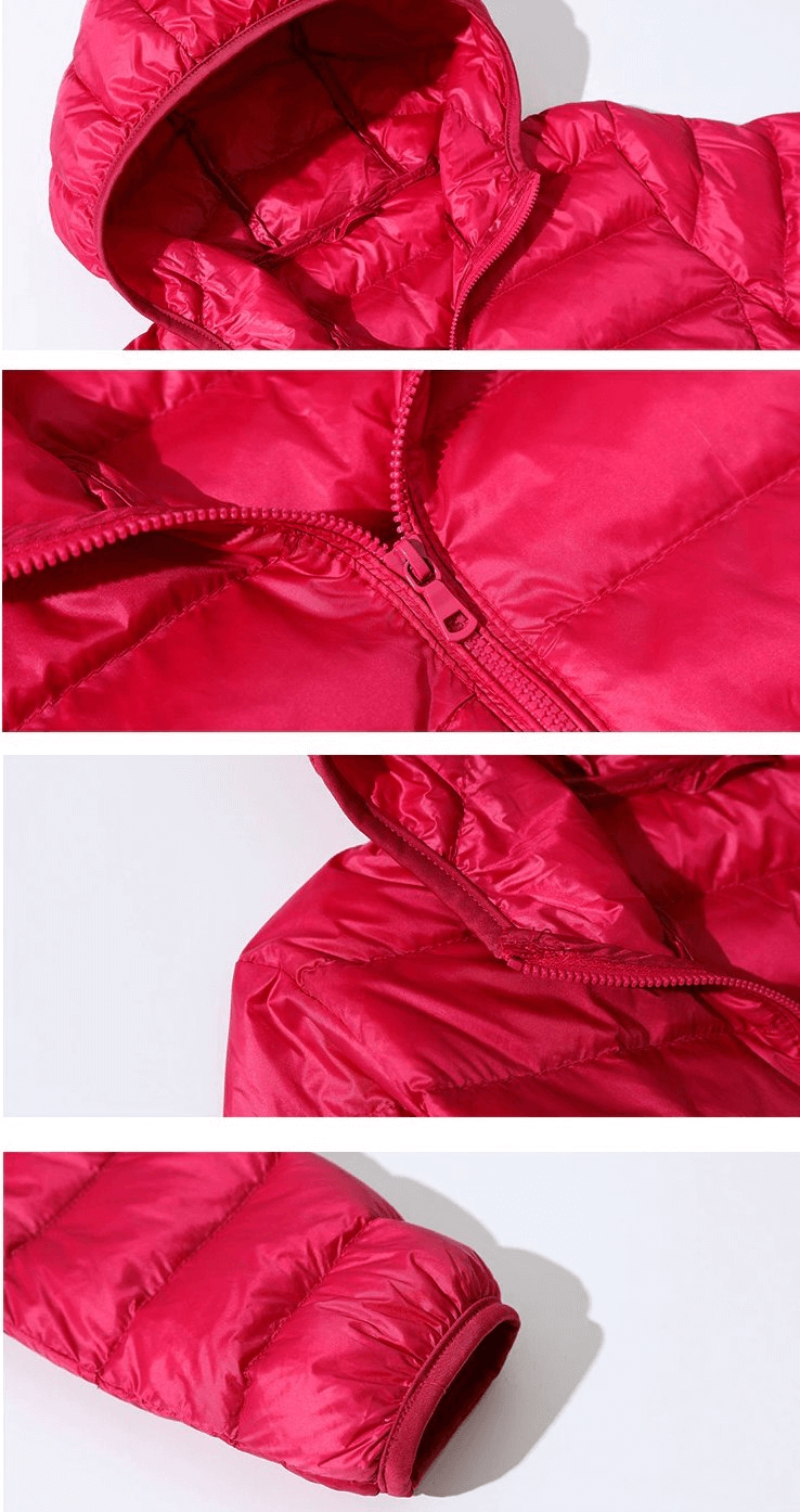 Close-up of red ultralight women's hooded jacket with zipper and sleeve details, showcasing premium hood insulation.