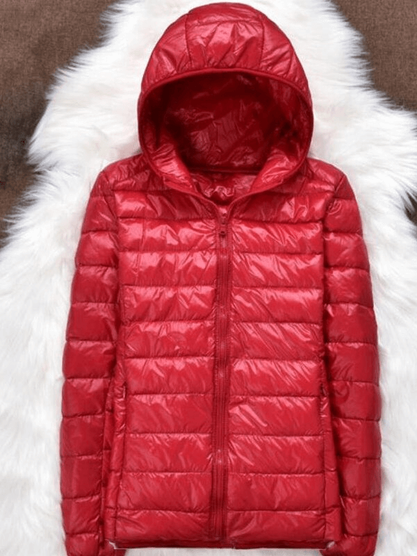Vibrant red women's ultralight hooded jacket with full sleeves, featuring zipper details and premium duck down insulation.