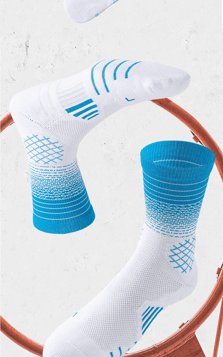 Fast-drying, breathable blue and white basketball knee-high socks for professional players, shown in action-ready style.