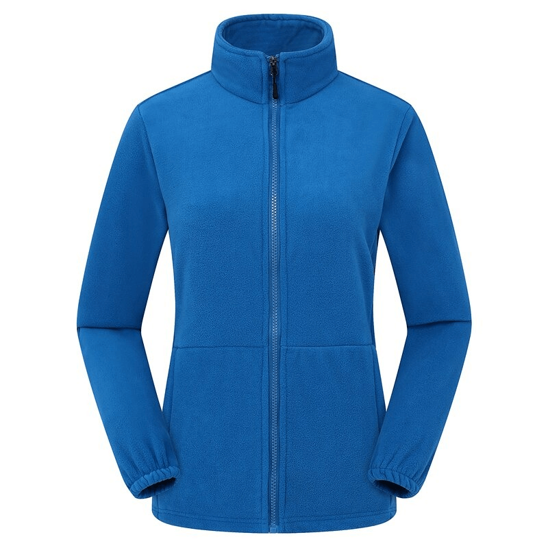 Blue female antistatic fleece hiking jacket with fitted cuffs, ideal for mountain climbing and outdoor adventures.