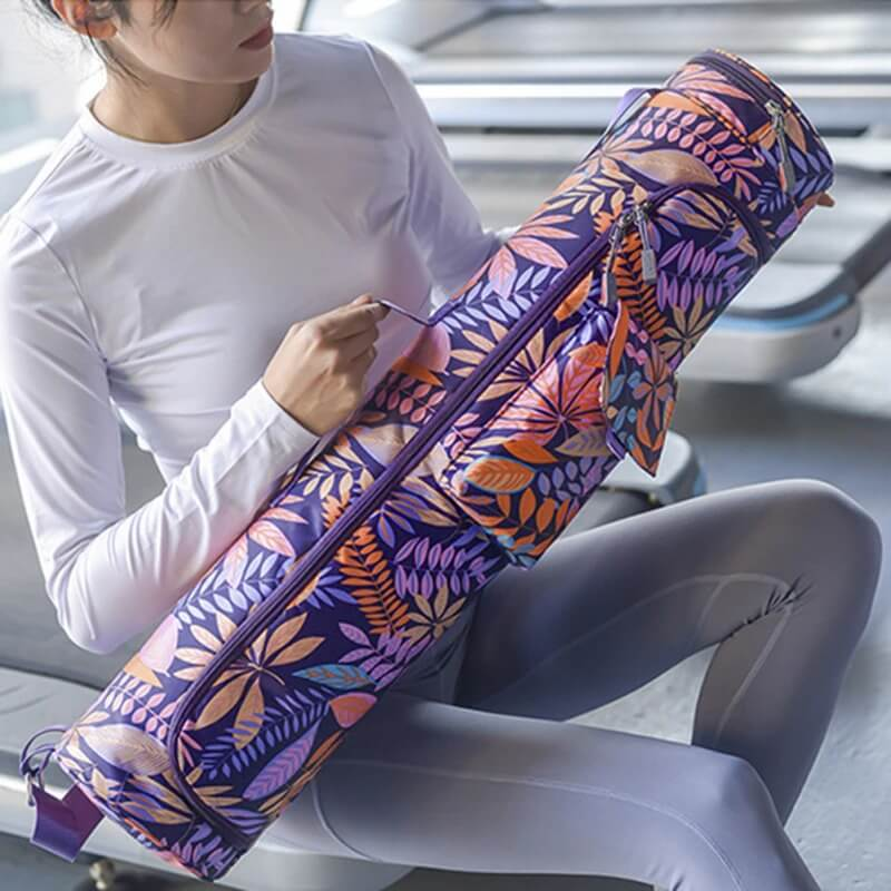 Unisex yoga mat bag with colorful female print design, made of durable microfiber. Perfect for carrying pilates and yoga gear.