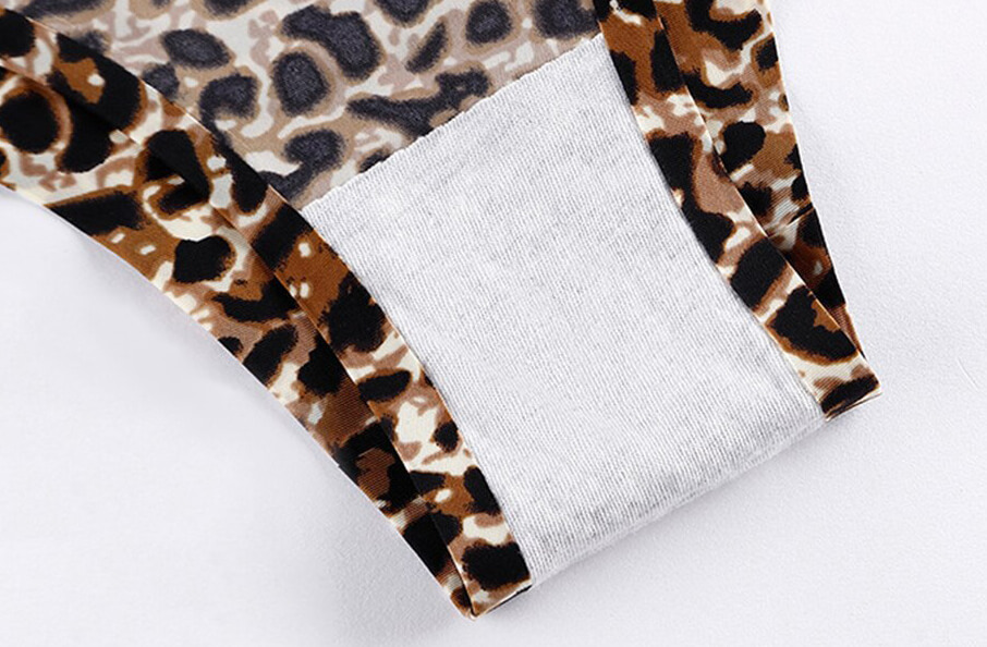 Close-up of seamless leopard print low waist briefs, showcasing stylish design and breathable nylon fabric, perfect for everyday wear.