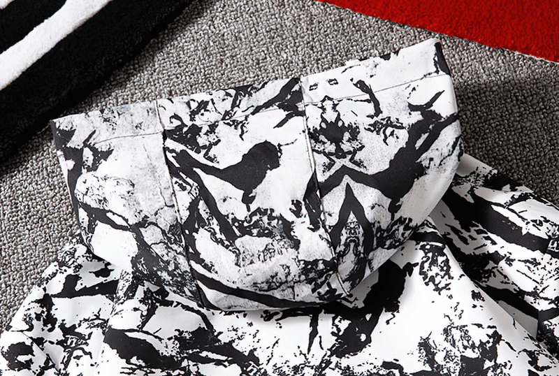 Close-up of patterned hood on a female zipper hooded jacket, lightweight windbreaker, black and white print, Polyester material.