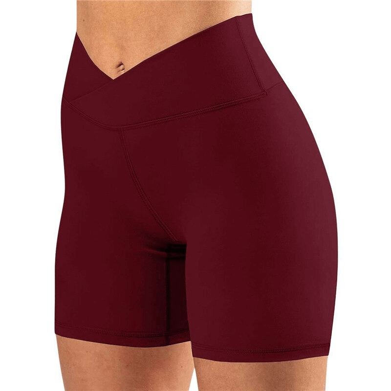 Women's high waist burgundy shorts, ideal for running and training, featuring elastic waistband and lightweight polyester blend.
