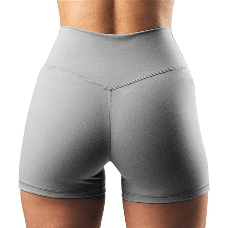 High-waist solid color fitness shorts for women, ideal for running and training. Comfortable, elastic fit for active lifestyles.