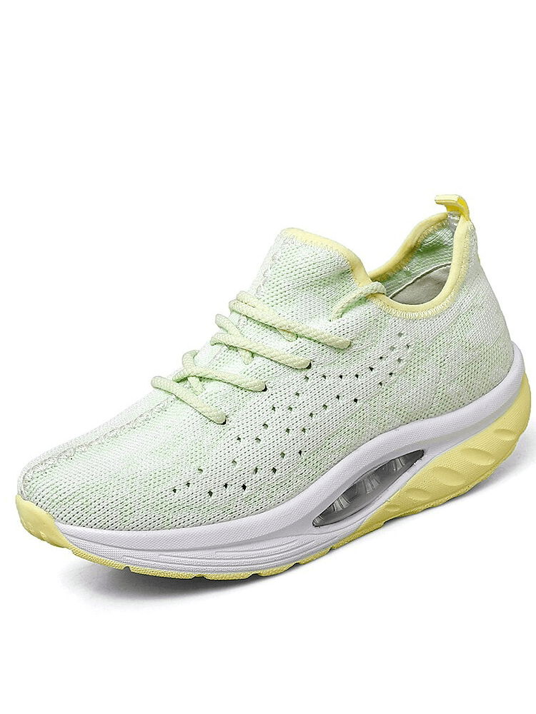 Light green lace-up platform sports sneaker for women featuring breathable mesh upper and cushioned EVA sole, style SF0253.