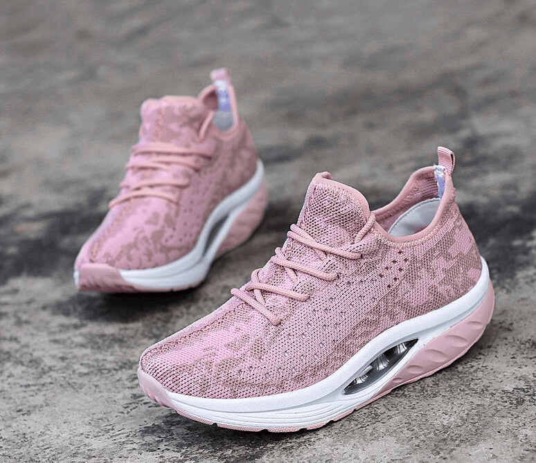 Pink lace-up platform sneakers for women with breathable mesh and EVA cushioning, perfect for fitness and everyday style.